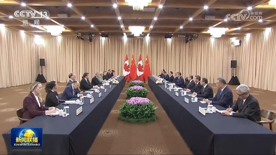 习近平会见加拿大总理
